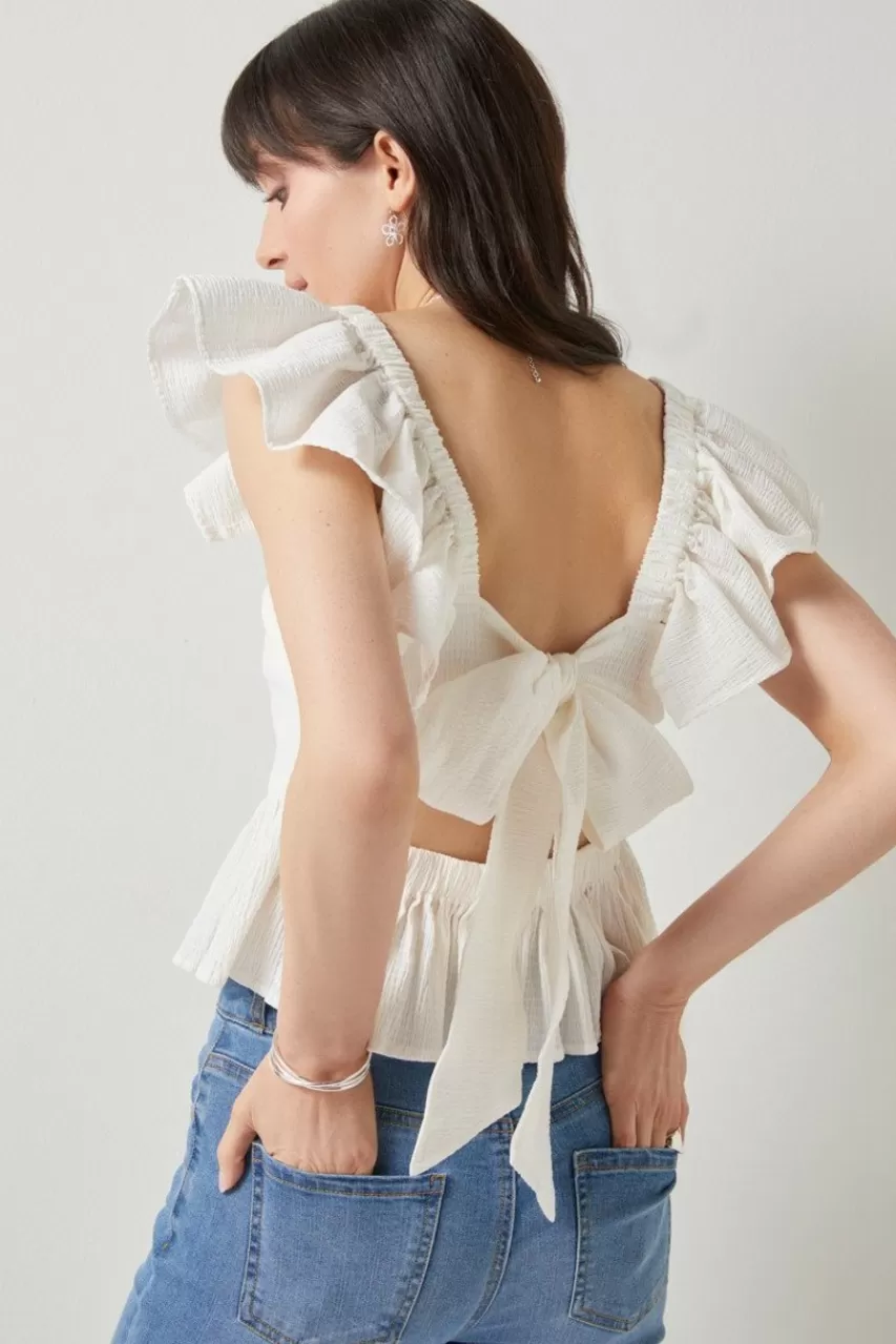 Francesca's Bella Flutter Sleeve Bow Back Top